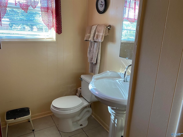 bathroom featuring tile patterned floors and toilet