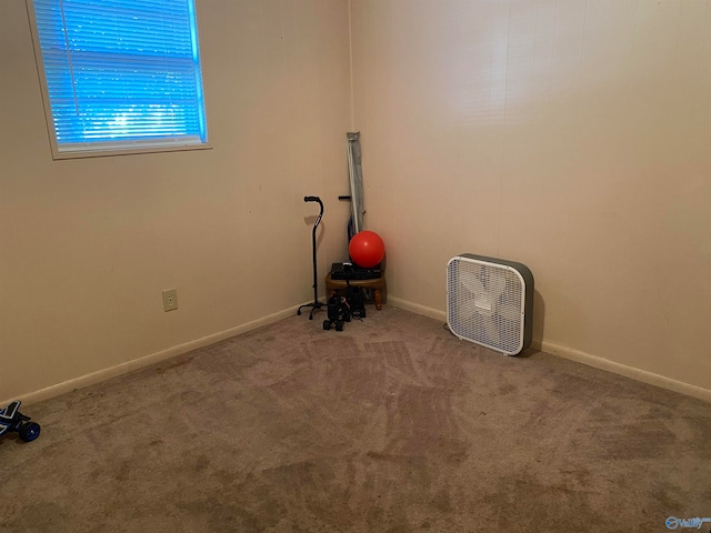 unfurnished room featuring carpet flooring