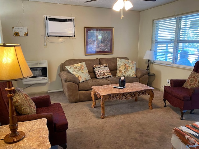 carpeted living room featuring a textured ceiling, heating unit, a wall mounted AC, and ceiling fan