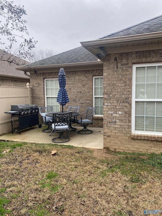 view of patio with a grill