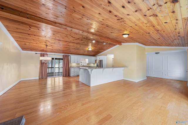 unfurnished living room featuring vaulted ceiling, crown molding, wood ceiling, and light hardwood / wood-style flooring