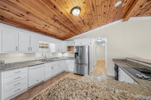 kitchen with ornamental molding, black appliances, white cabinets, and vaulted ceiling