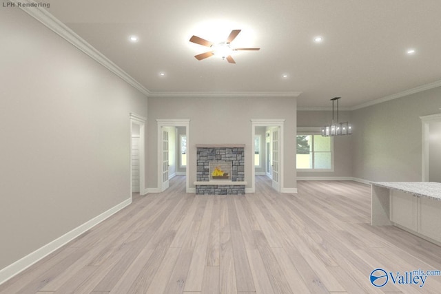 unfurnished living room with ceiling fan, crown molding, a wealth of natural light, and light hardwood / wood-style flooring