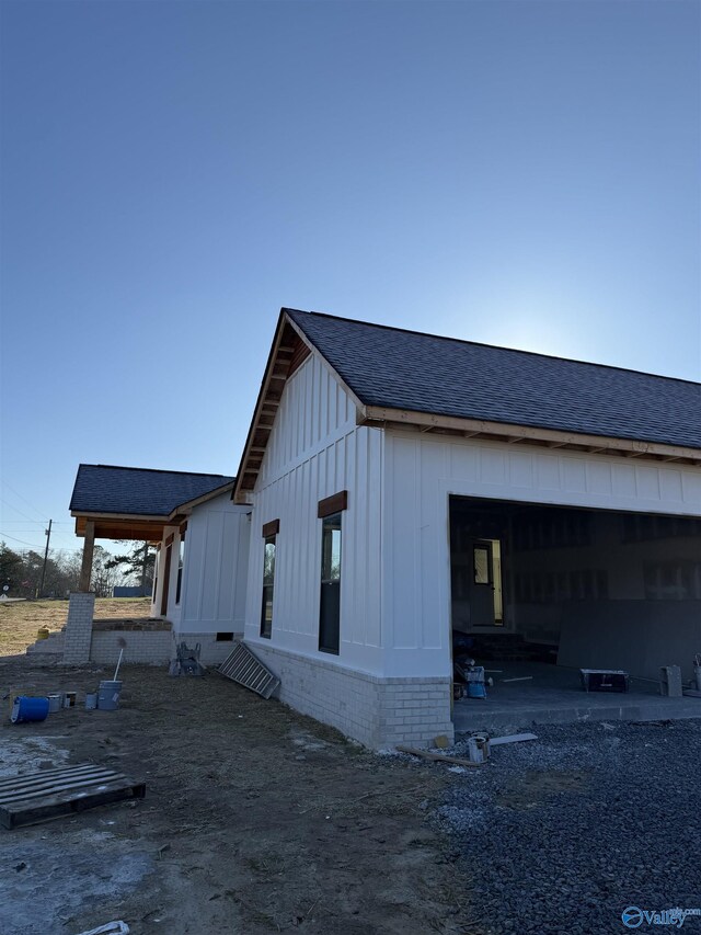 view of property exterior with a garage