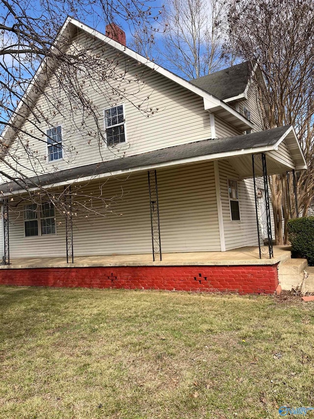 view of home's exterior featuring a lawn