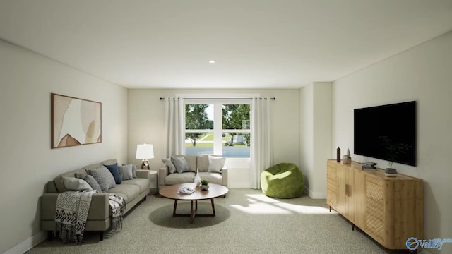 carpeted living area featuring baseboards