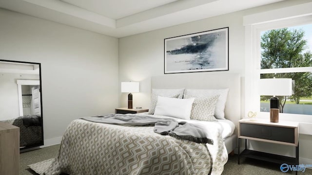 carpeted bedroom with baseboards and multiple windows