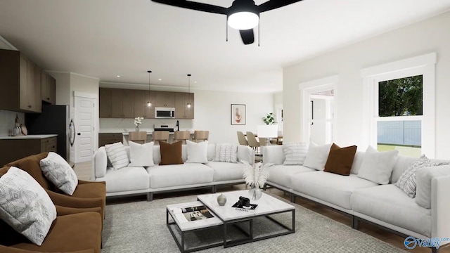 living room with a ceiling fan and recessed lighting