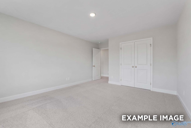 1748 Stampede Cir, Huntsville, AL 35803 - unfurnished bedroom with carpet floors, baseboards, a closet, and recessed lighting