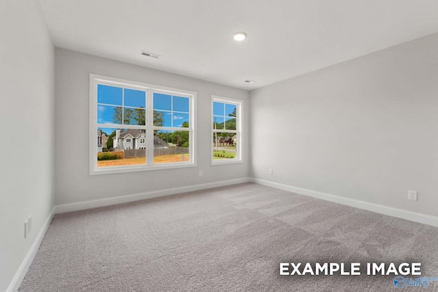 1748 Stampede Cir, Huntsville, AL 35803 - empty room featuring carpet floors, baseboards, and visible vents