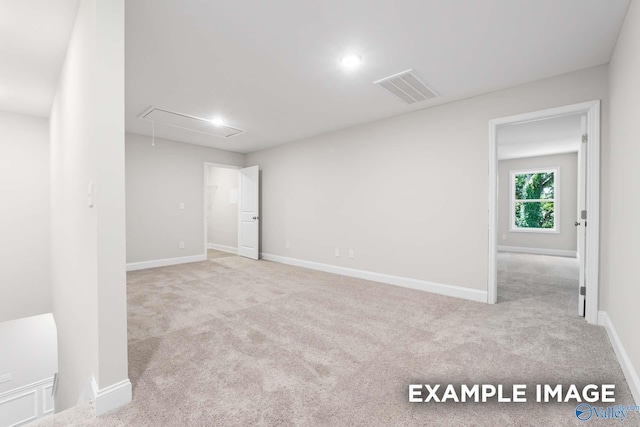 1748 Stampede Cir, Huntsville, AL 35803 - carpeted empty room featuring visible vents, attic access, baseboards, and recessed lighting