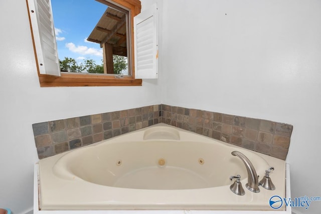 bathroom featuring a tub to relax in