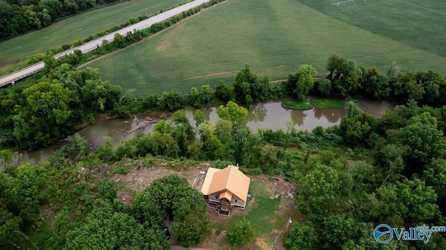 birds eye view of property with a water view and a rural view