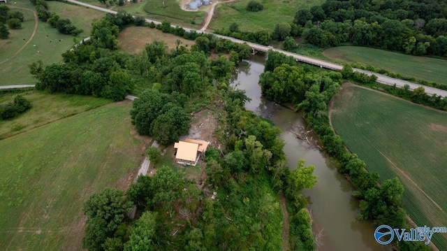 bird's eye view featuring a water view and a rural view