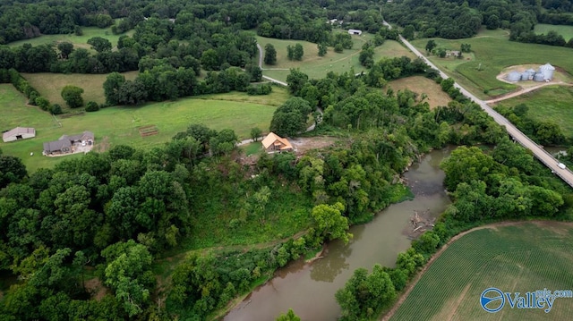 aerial view with a water view and a rural view