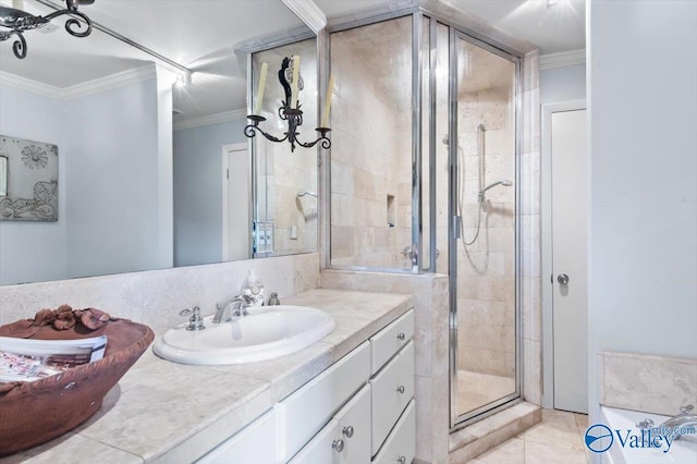 bathroom with crown molding, tile patterned floors, vanity, and an enclosed shower