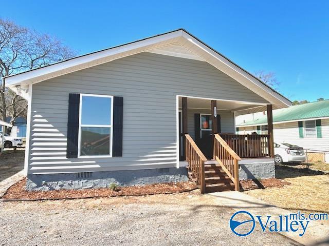 manufactured / mobile home featuring covered porch and crawl space