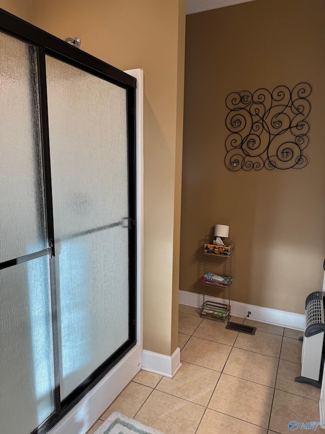 bathroom featuring tile patterned flooring