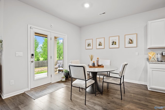 25066 Delilah Cir, Athens, AL 35613 - dining area with baseboards, visible vents, and dark wood-style floors