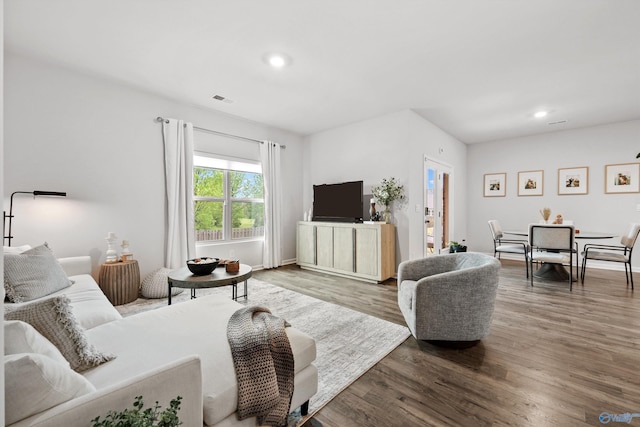 25066 Delilah Cir, Athens, AL 35613 - living room featuring recessed lighting, wood finished floors, and visible vents