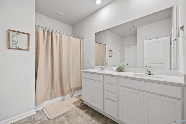 25066 Delilah Cir, Athens, AL 35613 - full bathroom with visible vents, a sink, and double vanity