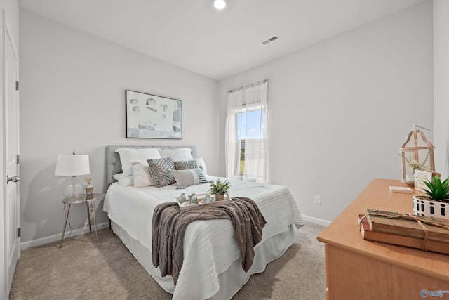 25066 Delilah Cir, Athens, AL 35613 - bedroom featuring visible vents, baseboards, and light carpet