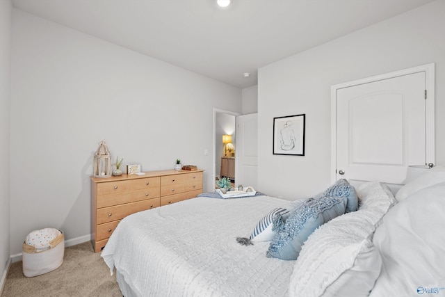 25066 Delilah Cir, Athens, AL 35613 - bedroom with light carpet and baseboards