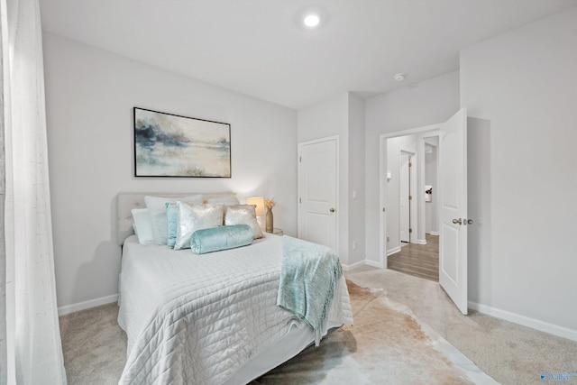 25066 Delilah Cir, Athens, AL 35613 - bedroom featuring baseboards and light colored carpet