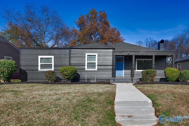 bungalow-style house with a porch and a front lawn