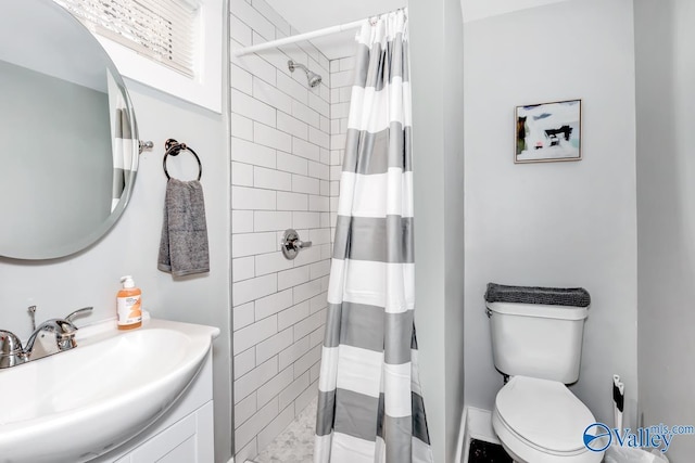 full bath featuring vanity, a shower stall, and toilet