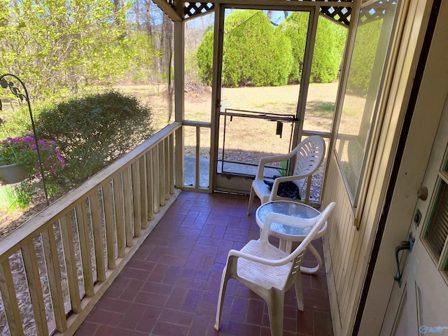 sunroom featuring a healthy amount of sunlight
