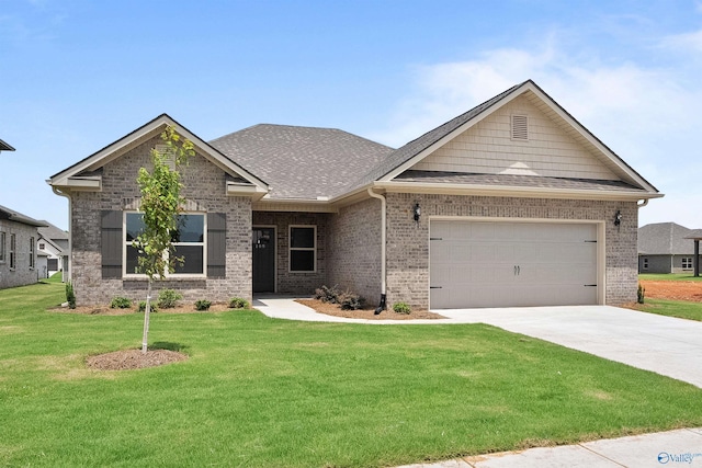 craftsman house featuring a garage and a front yard