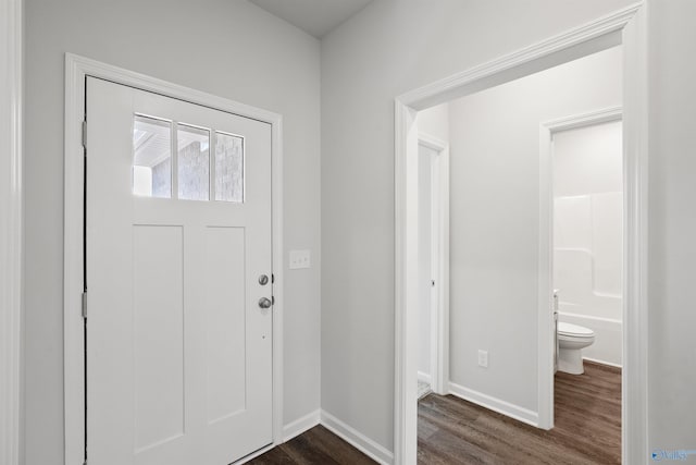 foyer with dark hardwood / wood-style flooring