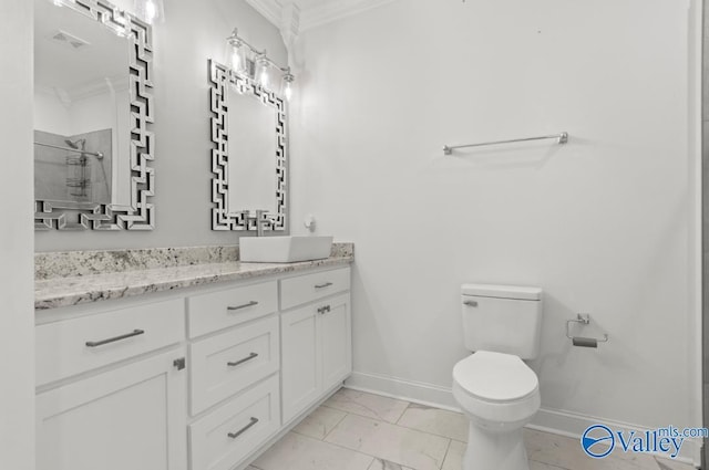 bathroom featuring a shower, toilet, vanity, and crown molding