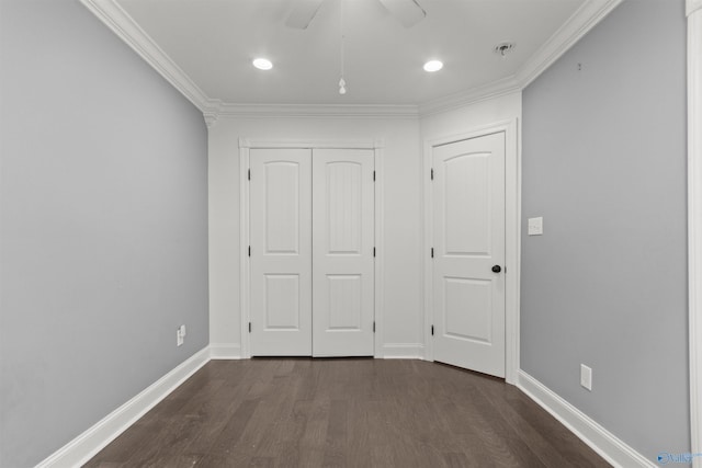 unfurnished bedroom with a closet, ceiling fan, ornamental molding, and dark wood-type flooring