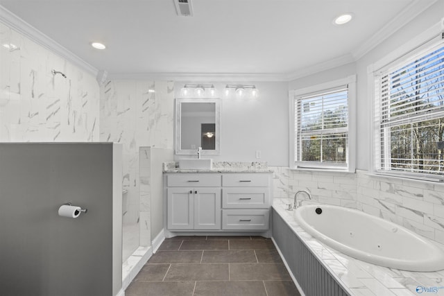 bathroom with crown molding, plus walk in shower, tile walls, tile patterned floors, and vanity