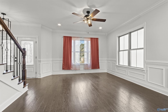 interior space featuring crown molding, ceiling fan, and dark hardwood / wood-style flooring