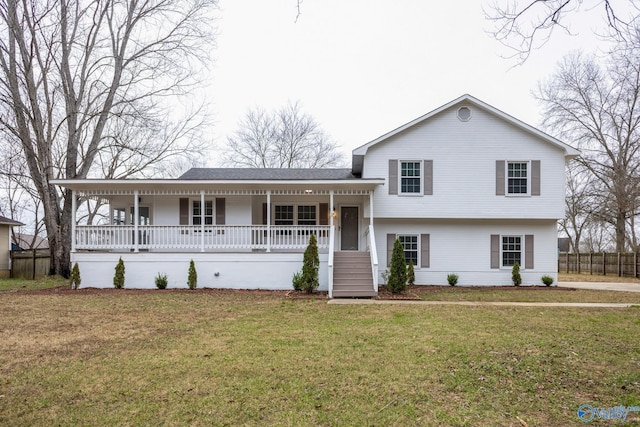 view of front facade with a front yard and a porch