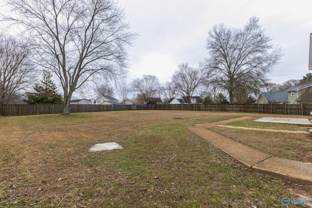 view of yard featuring a fenced backyard