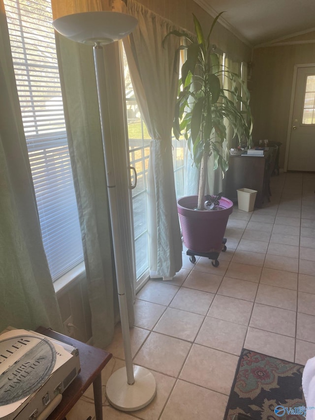 bathroom with crown molding and tile patterned floors