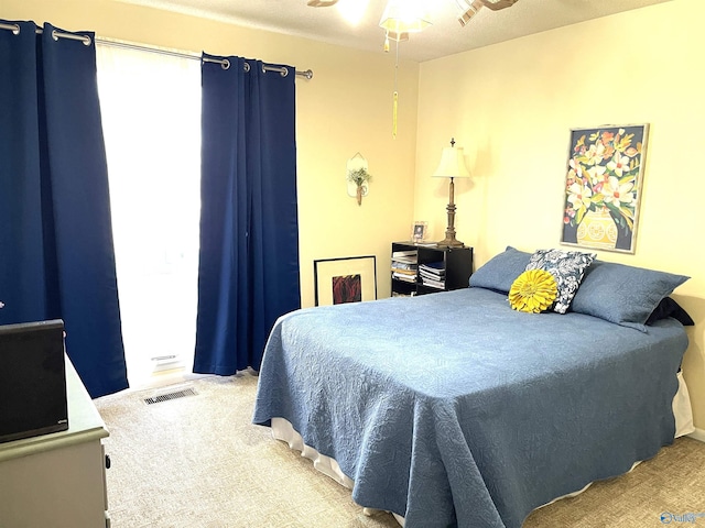 bedroom featuring carpet floors and ceiling fan