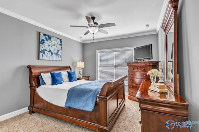 bedroom with ceiling fan, light colored carpet, visible vents, baseboards, and ornamental molding