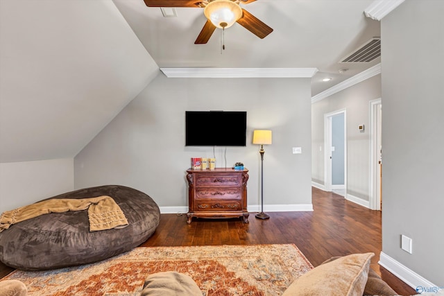 living area featuring lofted ceiling, visible vents, ornamental molding, baseboards, and hardwood / wood-style flooring