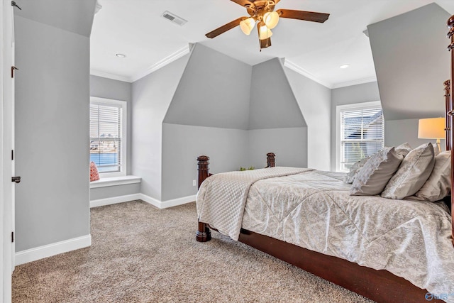 carpeted bedroom with recessed lighting, a ceiling fan, visible vents, baseboards, and ornamental molding