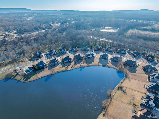 bird's eye view with a water and mountain view