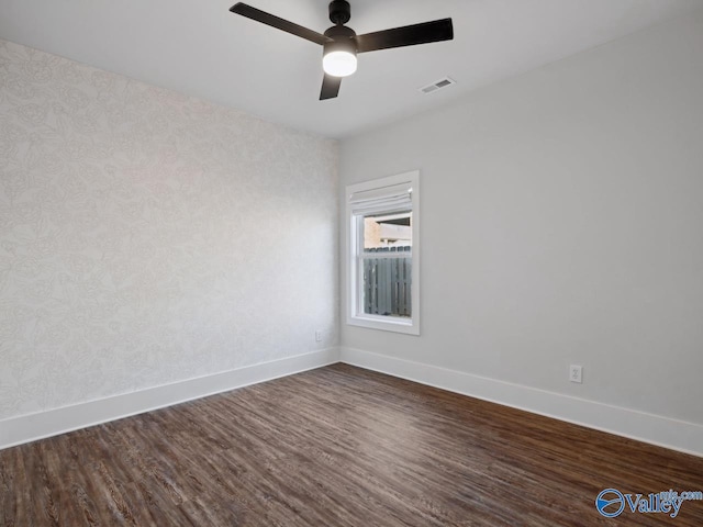 unfurnished room with wood-type flooring and ceiling fan