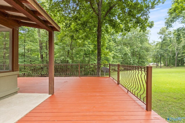 deck featuring a lawn