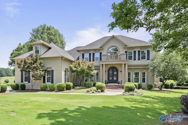 2600 Treyburne Ln, Hampton Cove, AL 35763 - georgian-style home with a front lawn and french doors