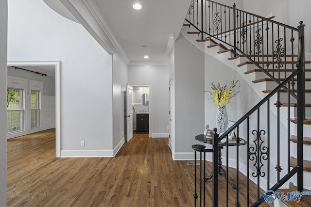 2600 Treyburne Ln, Hampton Cove, AL 35763 - staircase with ornamental molding, wood finished floors, and recessed lighting