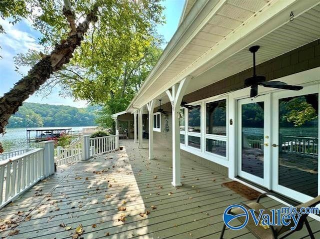 deck with ceiling fan and french doors